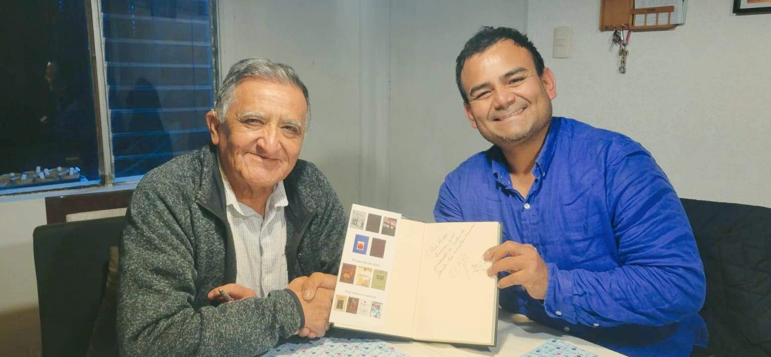 El investigador Dante E. Zegarra y el director Rubén Enzian.